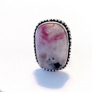 3/4 inch, 925 marked, Pink Flash Moonstone ring.